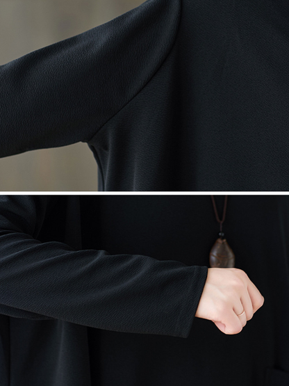 Asymmetrical Oversized Tunic Top with Sculpted Pockets in Black Polyester