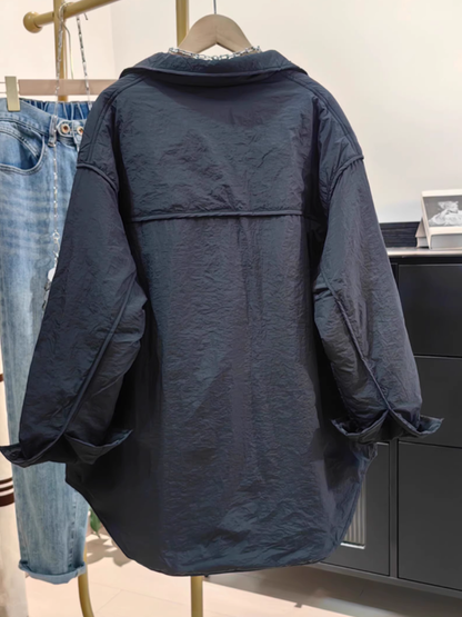 Oversized Utility Jacket with Curved Hem, Statement Pockets, Effortless Layering