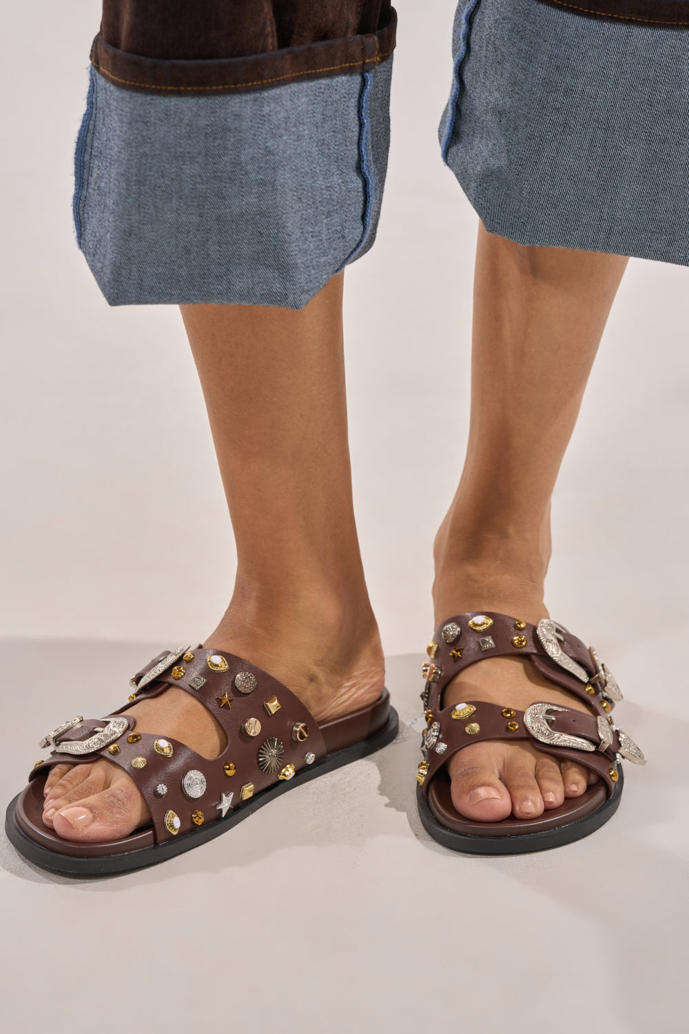 AKIRA BARCLAY BROWN METAL EMBELLISHED SLIP ON FLAT SANDAL