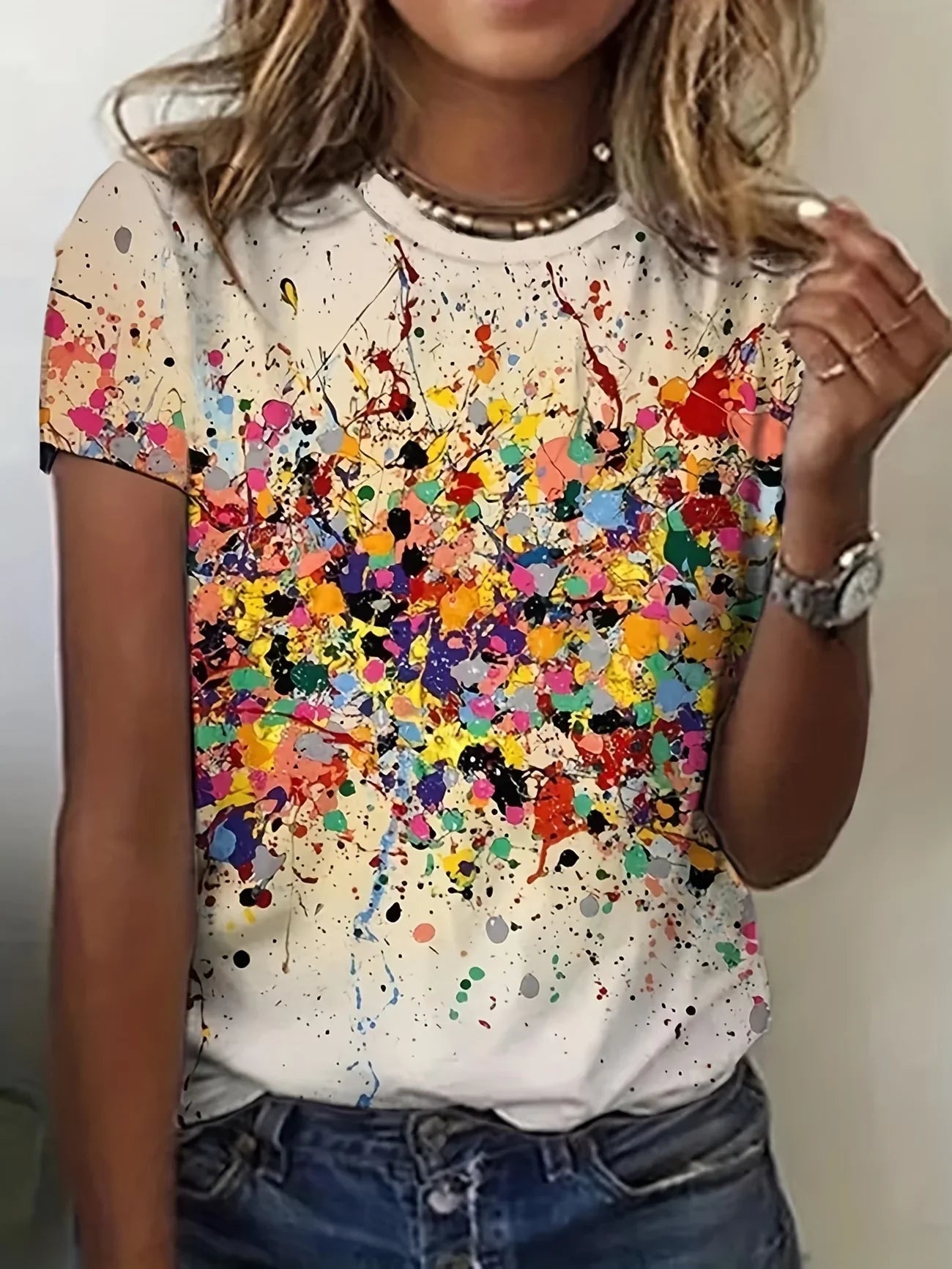 Stand out in this eye-catching graffiti art tee! Soft, breathable fabric, round neck, short sleeves, and a bold multicolored abs